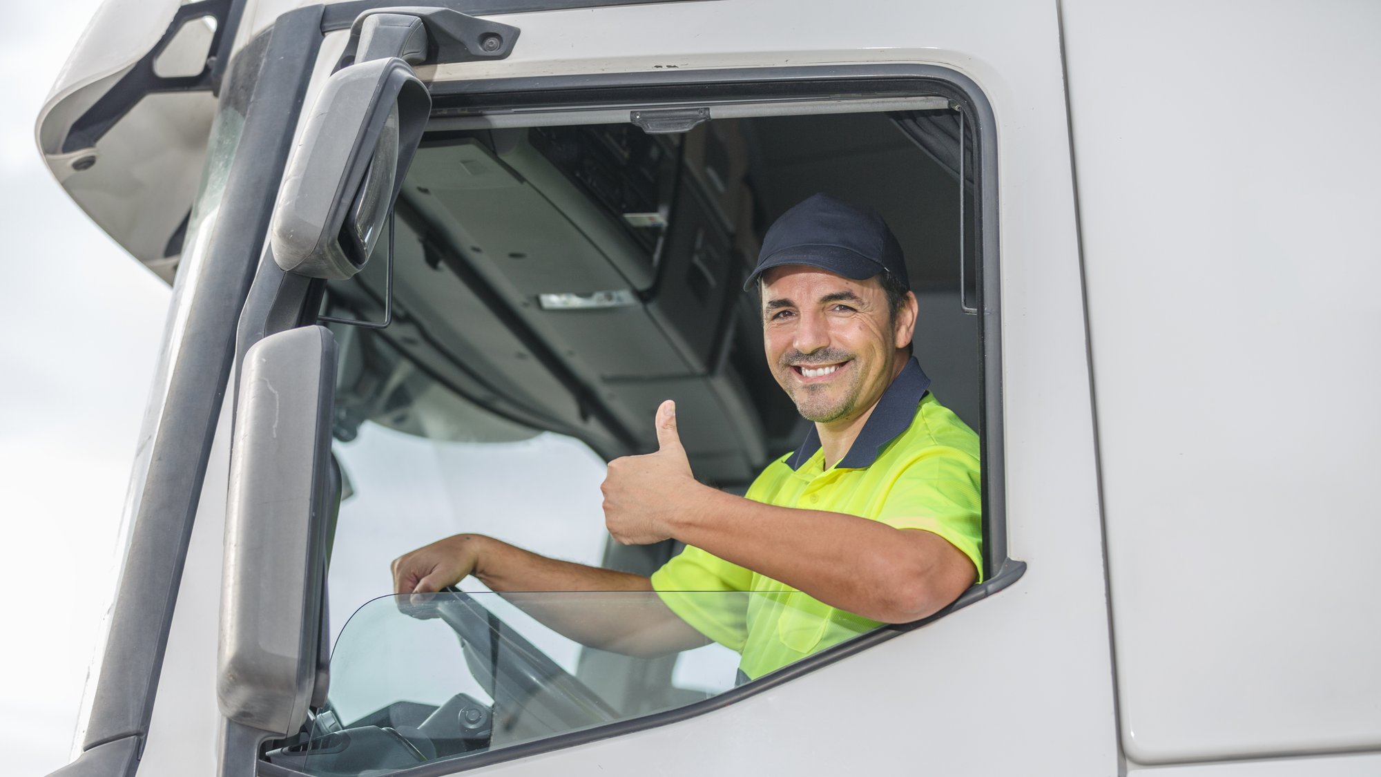 Truck diver thumbs up Truck diver thumbs up